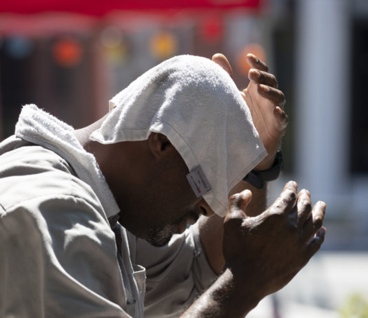 Photo of man enduring high temperatures
