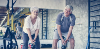 Photo of older couple exercising
