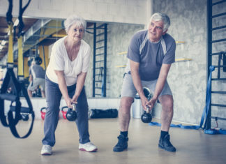 Photo of older couple exercising