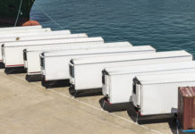 Vaccine distribution will require specialized handling Photo of refrigerated trailers