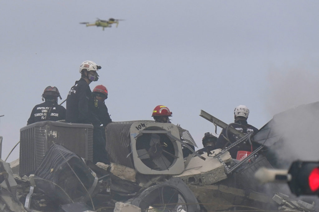 Phots of Rescuers and flying drone