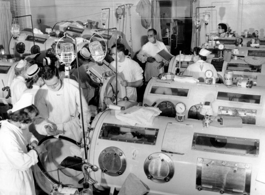Photo of Medicalstaff learning to work with Iron Lungs for Polio patients