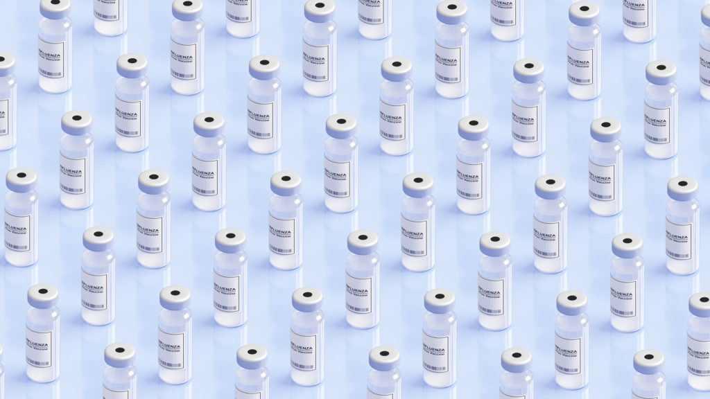 image of Influenza vaccine vials pattern background