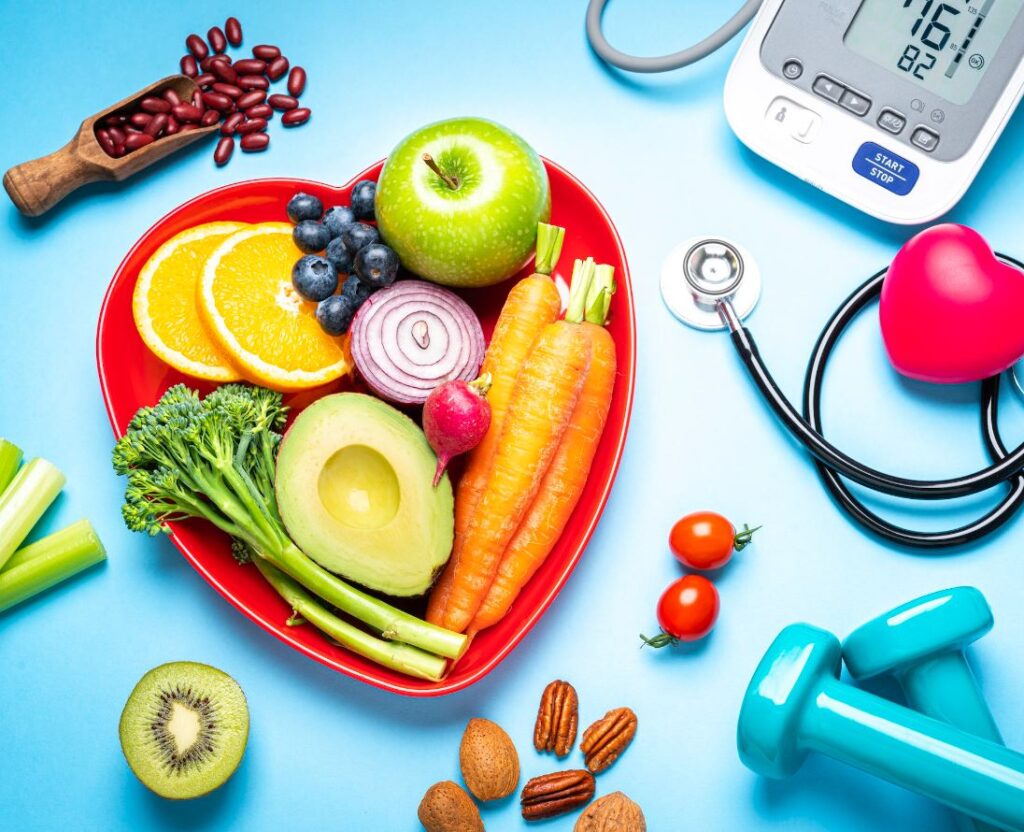 Photograph of fruits and vegetables in a heart-shaped serving bowl,