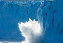 Understanding the pending AMOC problem Photo of an iceberg breaking off of a glacier