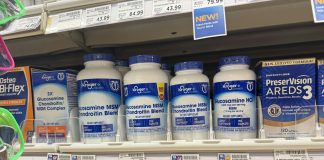 Photo of bottles of glucosamine tablets on a store shelf